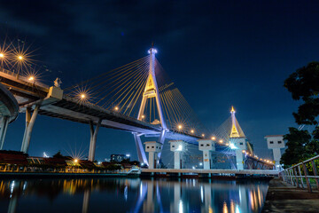 Bhumibol suspension bridge cross over Chao Phraya River in Bangkok, thailand  at evening. Is one of the most beautiful bridges in Thailand. Selective focus.