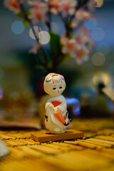 Japanese doll wearing a kimono