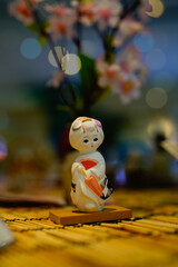 Japanese doll wearing a kimono