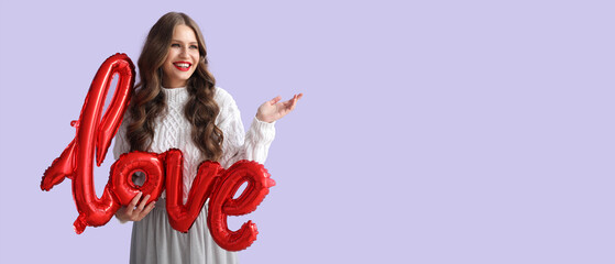 Beautiful young woman with balloon in shape of word LOVE on color background with space for text....