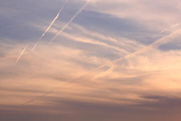 Contrail and Evening Sky under Sunset
