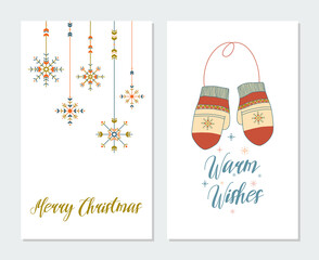 Set of Boho Christmas greeting cards. Hand drawn vector illustrations in boho style. Mittens, snowflakes and lettering. New Year 2022