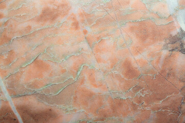 Background Stone wall background with abstract spots. Beautiful gray marble texture with stains, abstract surface background. Finishing stone for building cladding. Furniture granite. pink marble