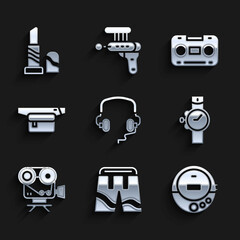 Set Headphones, Short or pants, Music CD player, Wrist watch, Retro cinema camera, Waist bag of banana, audio cassette tape and Lipstick icon. Vector
