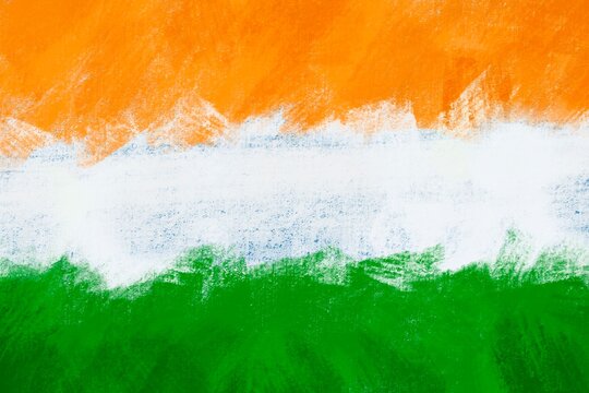 Abstract wall surface painted with Indian flag colours with rough brush strokes