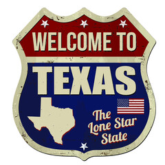 Welcome to Texas vintage rusty metal sign on a white background, vector illustration © Balint Radu