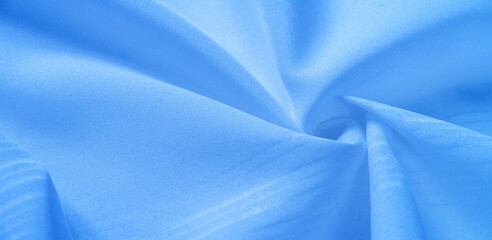 texture background, pattern.  silk blue fabric. From Telio, this organza has a thin, open weave...