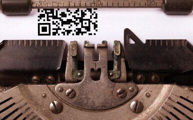 Modern QR-code inscription made by old typewriter