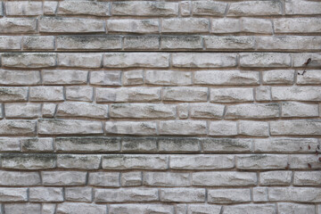 Obraz premium Concrete imitation of bricks on the fence. Texture