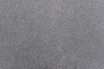 Dark asphalt texture. Gray background