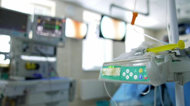 Medical equipment necessary for surgical operations. close up. Blurred background with working screens and monitors.