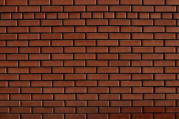 Bright dark brown bricks . Wall texture. Background 