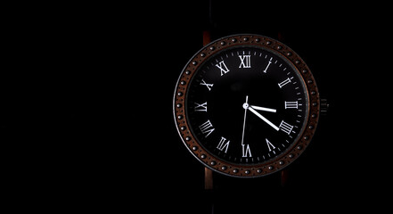 Luxury men's watches on a black background. Stock photo of the watch