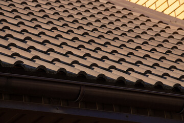Fototapeta na wymiar Roof metal sheets. Modern types of roofing materials
