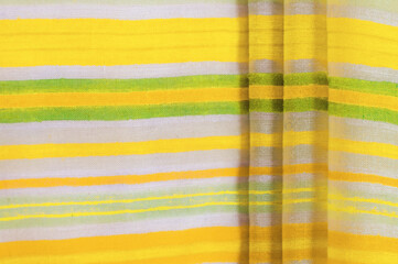 Texture, background, pattern, yellow stripes, cotton fabric, Mapudungun pontro poncho, blanket, woolen fabric - these are outerwear designed to keep the body warm.