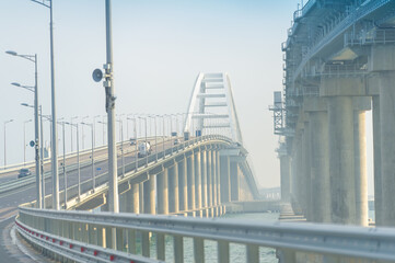 Photo of a large engineering bridge across the Kerch Strait connecting the mainland with the Crimean Peninsula, 10-15-2019 Russia, the Caspian Sea