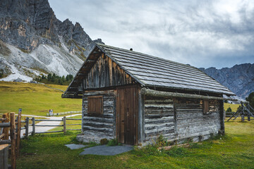 old wooden house in mountains of dolomites