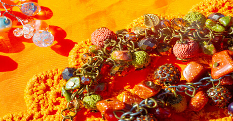 Texture, background, pattern. Folk art. Beads from multi-colored stones and glass