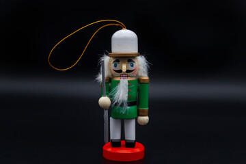 A toy soldier isolated on a black background