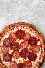Homemade cheese pizza with salami, delicious pizza with cheddar. pepperoni pizza