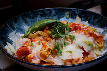 Delicious homemade Italian seafood pasta with shrimps, lobster and parmesan cheese