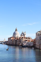 Venetian gondola on Grand Canal of Venice in Italy.