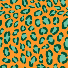 Seamless pattern of abstract yellow green leopard skin. Background design, textile decoration, animalistic print.