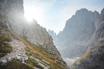 trekking trail in the pale di san martino on a sunny day in the dolomites