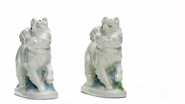 two statuettes depicting dogs. painted with porcelain paints. collectibles. Swap meet. Antiques, art.