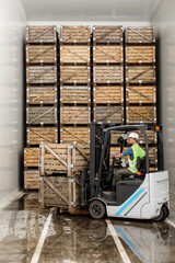 Modern warehouse, work on forklift, industry and organic agribusiness © Prostock-studio