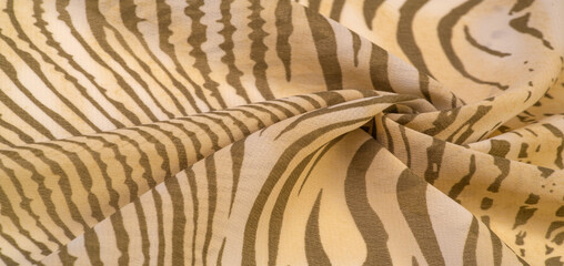 silk fabric in brown and white stripes, zebra skin in African style. Repeating striped background...