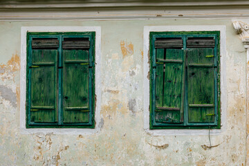 old window with shutters in the village of Viscri in Romania