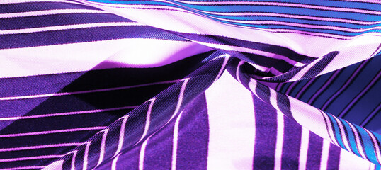 Texture, background, silk fabric with a blue striped pattern. The design of this fabric is devoted...