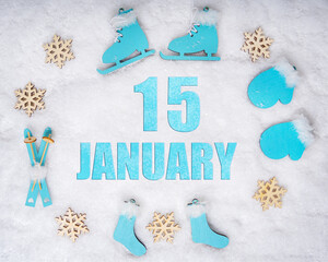 January 15th. Sports set with blue wooden skates, skis, sledges and snowflakes and a calendar date....