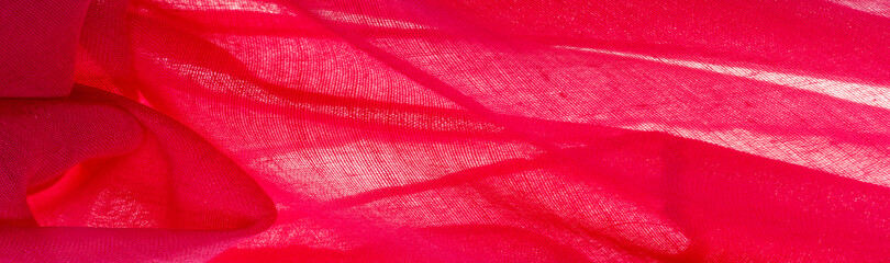 Texture.Background. fabric silk red matte of a color, (paint, or surface) dull and flat, without a shine.