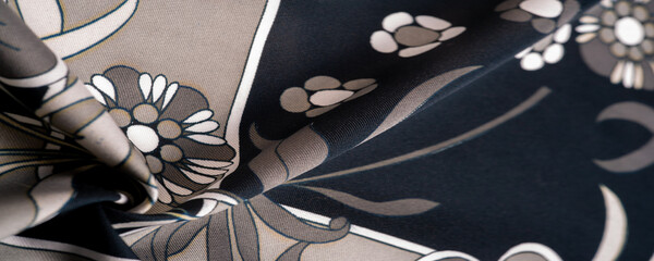 Texture, background, pattern, black silk with a print of white flowers, geometric lines. Introduces...