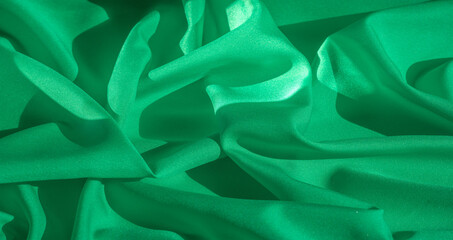 Texture, silk fabric of green color, solid light green silk satin fabric of the duchess Really...