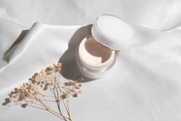 white fabric textile background with lifestyle, cosmetic makeup bottle lotion cream product with beauty fashion skincare healthcare mockup