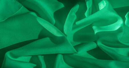 Texture, silk fabric of green color, solid light green silk satin fabric of the duchess Really...