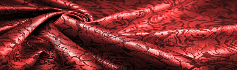 relief pattern, composite textiles, red silk fabric, with a floral pattern, unusually pleasant...
