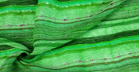 Green wool scarf. A quality and delicate scarf that gives an elegant and upscale look to any design. smooth sequined striped prints