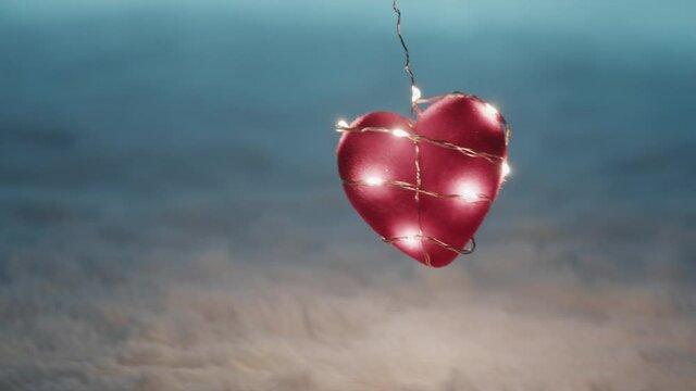 Cuore rosso su tappeto bianco con striscia luci led