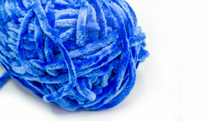 Sewing products. A roll of blue wool yarn. This yarn has a great