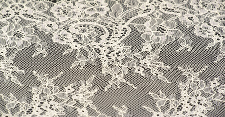 Openwork fabric of light cream color. Organza fabric with geometric embroidery. With floral...