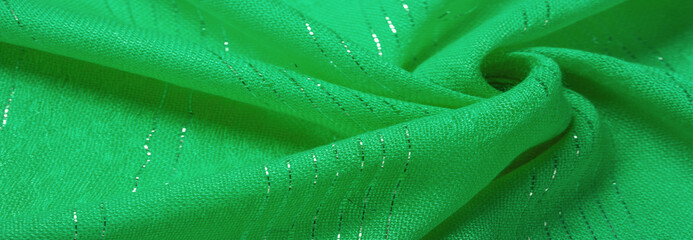 green emerald sequin fabric, white strip of silver stripes, designer fabric. Texture, background