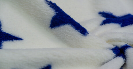 Velvet. Plush. Blue stars on a white background, new popular fabric, classic plush. This material...