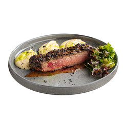 Isolated beef pepper steak with celery puree dish