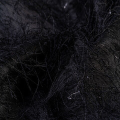 Charcoal black silk fabric with sequins and yarns over the surface of the fabric. This ombre tulle...