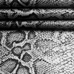fabric with a pattern of gray snake skin, African fabric, design photo - safari in the country of Africa. Texture, background