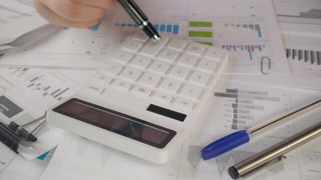 White digital calculator close company profit calculation 4k stock footage